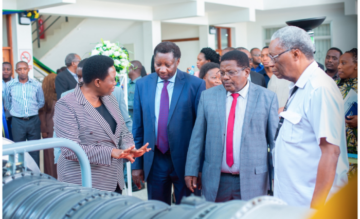 Prof Nombo Moja Tanzania’s Ministry of Education Science and Technology, Deputy Permanent Secretary Prof Caroline Nombo (1st-Left) looking at some of the equipment that will be used for training of aircraft maintenance engineering personnel at the National Institute of Transport (NIT). Others in the photo are NIT Rector Prof Zacharia Mganilwa (3rd-right) and NIT’s Governing Council’s Chairman Prof Blasius Bavo Nyichomba (2ND-Right)