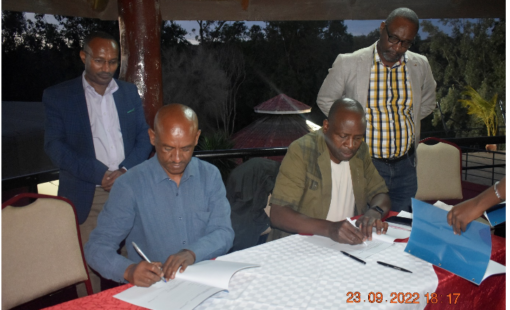 Director, KIHBT, Eng. Nabende (left) and the Dean-GWPTC, (Right) signing a Cooperation Agreement
